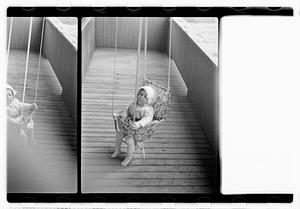 Child in a swing seat