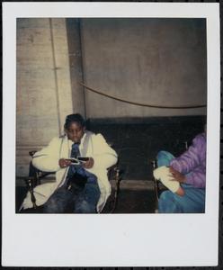 Young photographer admiring their work