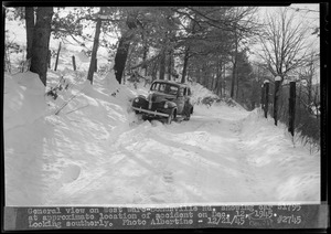 General view of West Ware-Bondsville Road showing car S-1795 at approximate location of accident on Dec. 21, 1945, looking southerly, Ware, Mass., Dec. 21, 1945