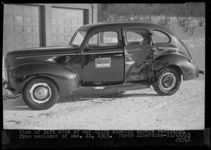 View of left side of car S-1795 showing damage resulting from accident of Dec. 21, 1945, Quabbin Administration Complex, Belchertown, Mass., Dec. 21, 1945