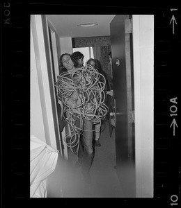 Man with rappelling rope in Ruedi Wyrsch's room at Sheraton Boston