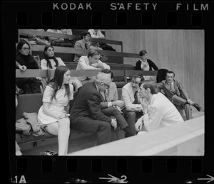 People in Boston City Council chambers