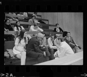 People in Boston City Council chambers