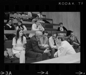 People in Boston City Council chambers