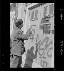 Western Union representative George Welford tries to persuade women inside Harvard building that he's not a law officer and is only trying to deliver a telegram