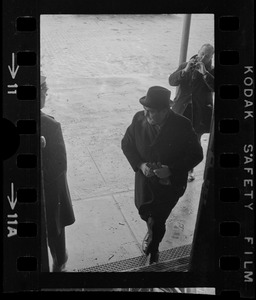 Unidentified man arriving at inauguration of Mayor Kevin White at Faneuil Hall