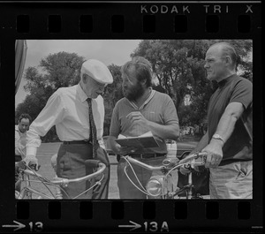 Dr. Paul Dudley White and two unidentified men on Cyclist Day in Boston Common