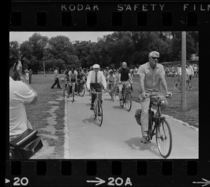 Dr. Paul Dudley White and cyclists on Cyclist Day in Boston Common