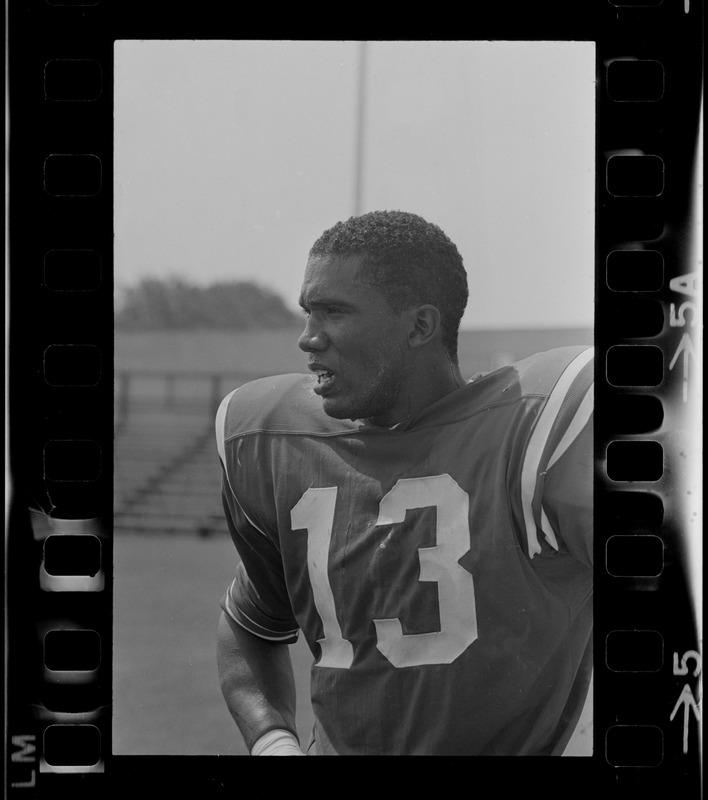 R. C. Gamble, Pats' standout sophomore running back, douses himself with a sopping wet towel to counteract 90 degree temperatures which prevailed during club's intra-squad scrimmage