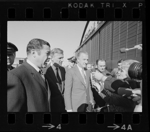Vice President Agnew and Sen. Edward Brooke, left, who traveled with him, are welcomed to Boston by Gov. Sargent and newsmen