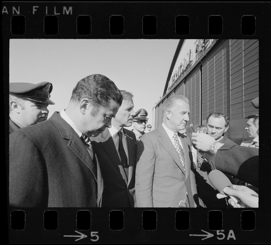 Vice President Agnew and Sen. Edward Brooke, left, who traveled with him, are welcomed to Boston by Gov. Sargent and newsmen