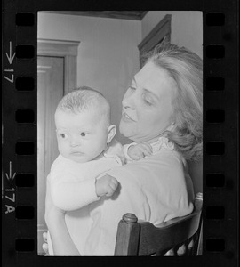 Maggie Bellotti, wife of Francis X. Bellotti, holding baby