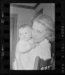 Maggie Bellotti, wife of Francis X. Bellotti, holding baby