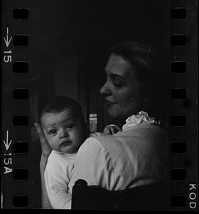 Maggie Bellotti, wife of Francis X. Bellotti, holding baby