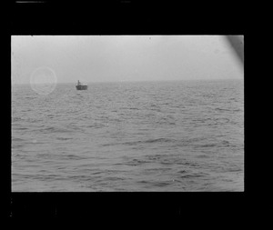 Small boat on the ocean