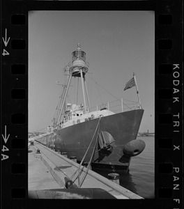 The Ambrose Lightship, for years a fixture at the entrance to New York Harbor, is moored at the Coast Guard base in Boston for refitting