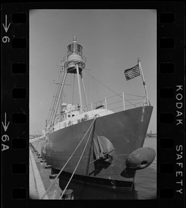 The Ambrose Lightship, for years a fixture at the entrance to New York Harbor, is moored at the Coast Guard base in Boston for refitting