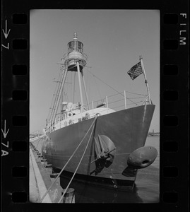 The Ambrose Lightship, for years a fixture at the entrance to New York Harbor, is moored at the Coast Guard base in Boston for refitting