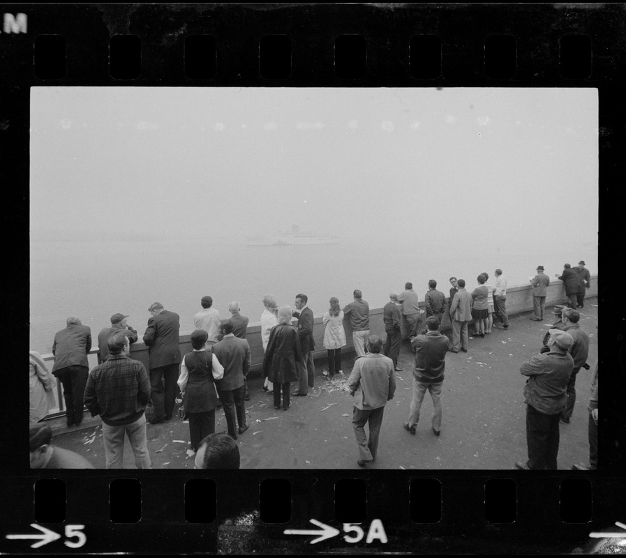 SS Amerikanis slices out of fog as worried kin of passengers wait