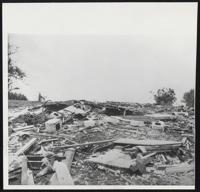 Scattered Wreckage is all that remains of this two-story farm home after tornado tore across Woodville, Wis. In the house at the time were Mrs. Wilfred Helgeson and her five children. They escaped serious injury.