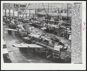 Los Angeles – Strike Stops Jet Plane Production – This is the scene at North American Aviation company’s F-86 Sabre jet assembly line today as a result of the strike that has halted production of jet fighters and interceptors in three factories across the nation. Some 33,000 workers have been idled since the walkout began at 12:01 a.m. yesterday in a dispute over the CIO United Auto Workers union wage and contract demands. The company’s plants at Columbus, O., and Fresno, Calif., also have been struck.