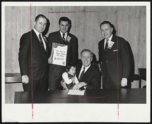 Cerebral Palsy poster girl Mary Houghton, of Somerville, is held by Mayor White at the kickoff of fund raising telethon being aired on Channel 38 this weekend. From left, Atty. James J. Haroules, Cerebral Palsy president of Greater Boston, Martin H. Reiss, 1970 campaign chairman, and Herbert L. Connolly, state president.