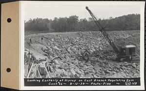 Contract No. 66, Regulating Dams, Middle Branch (New Salem), and East Branch of the Swift River, Hardwick and Petersham (formerly Dana), looking easterly at riprap on east branch regulating dam, Hardwick, Mass., Sep. 12, 1939