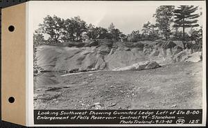 Contract No. 99, Enlargement of Fells High Level Distribution Reservoir, Stoneham, Malden, Melrose, looking southwest showing gunnited ledge left of Sta. 8+00, enlargement of Fells Reservoir, Stoneham, Mass., Sep. 13, 1940