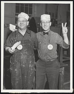 Two for the IUE -- Stanley Michalik (left) and Donat Vienneau of Lynn cast their votes for CIO union at NLRB election in General Electric Company plant.