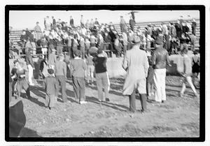 A crowd of boys on bleachers