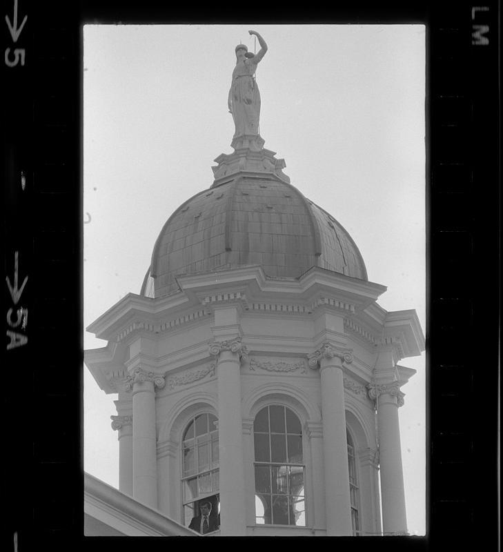 Man looking from Exeter Town Hall tower