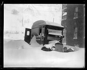 A car buried in snow