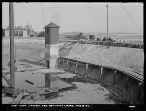Distribution Department, Chelsea Reservoir, repairing lining, Chelsea, Mass., Aug. 15, 1904