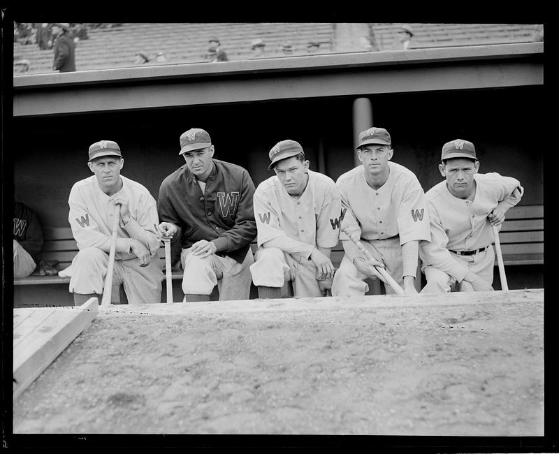 Washington Senator players in the dugout at Fenway Park