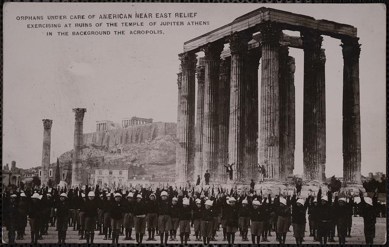 Orphans under care of American Near East Relief exercising at ruins of the temple of Jupiter Athens, in the background the Acropolis