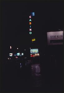 Casino Theatre sign lit up at night