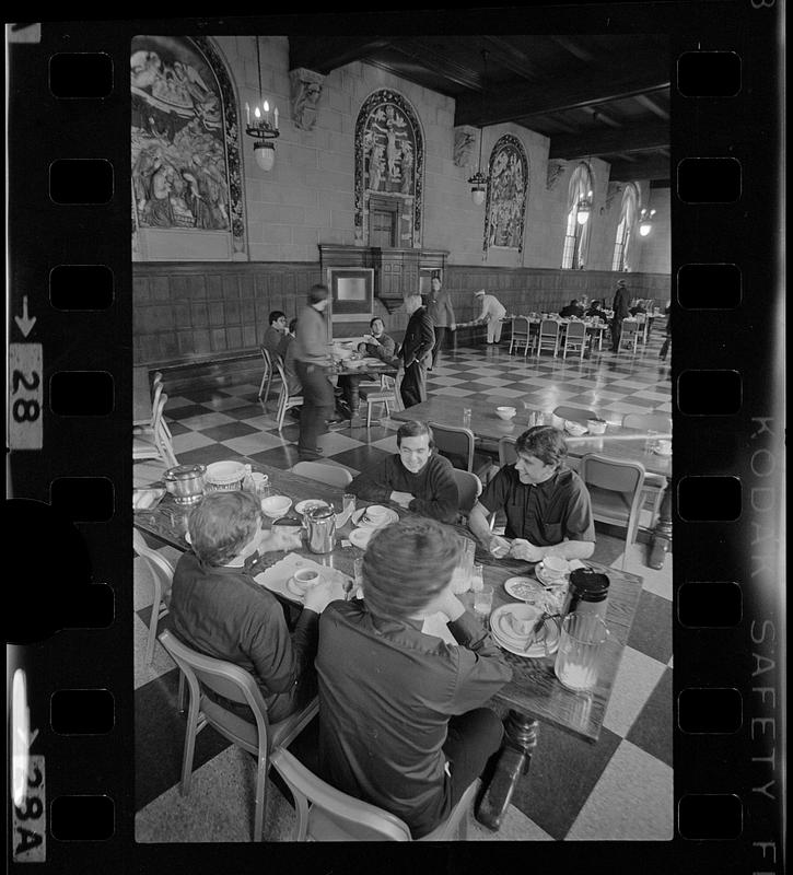 Student priests in seminary dining room, Brighton