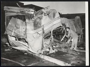 School Bus in which two children and a mother were reported to have been killed by the tornado in the Curtis Veterans' Housing Project in the Great Brook Valley of Worcester.