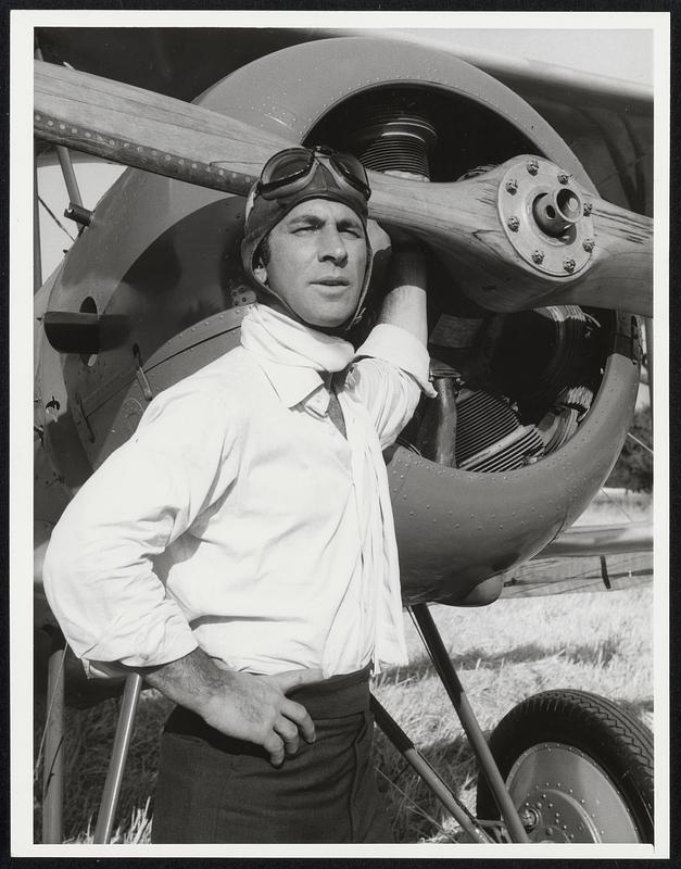 Ace---"Pilot" Maxwell Smart (Don Adams) stands proudly in front of his World War I plane, a Nieuport 28 -- the only plane available when Smart takes to the air to battle KAOS -- in "Snoopy Smart Versus the Red Baron" on NBC-TV's "Get Smart" Saturday, Sept. 28 (color; 8-8:30 p.m. PDT & EDT; 7-7:30 p.m. CDT).