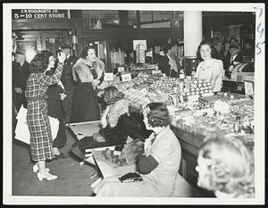 Sit-Downers Berate Non-Strikers. New York, March 18-- Striking sales girls at a Manhattan unit of the F.W. Woolworth company berate the 27 non-striking girls who went to work this morning when the Be-Leaguered store was opened an hour late. A prolonged out-burst of noise from the sit-downers who occupied cots in the aisles greeted non-strikers when they went to work.