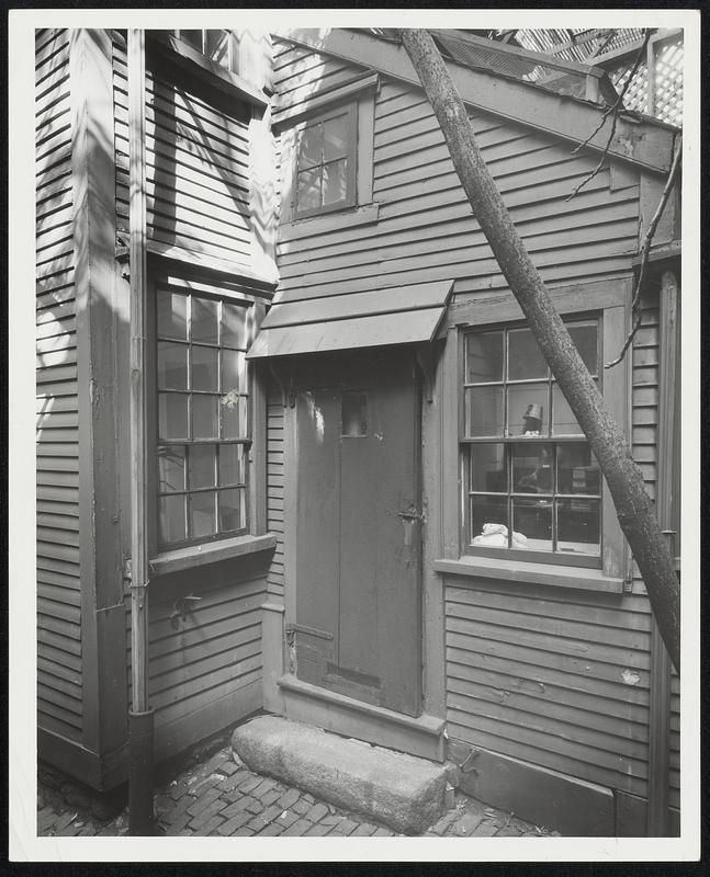 Vanishing Landmarks-These ancient doors are details of the last of Beacon Hill's "country houses," the Convent of St. Anne at 44 - 46 Temple street, which the city has condemned as unsafe. The door at the left, with its classic pediment, was put there by Bela Clapp, housewright, when he erected the building in 1787.