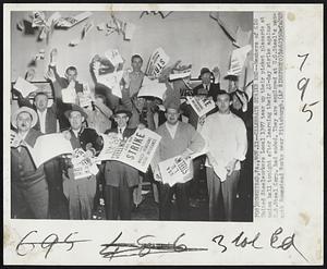 Celebrate Strike End -- Members of CIO United Steelworkers Local 1397 tear up their picket placards at union hall tonight after learning their 42-day strike against U.S. Steel Corp. had ended. They are employed at U.S. Steel's mammoth Homestead Works near Pittsburgh.