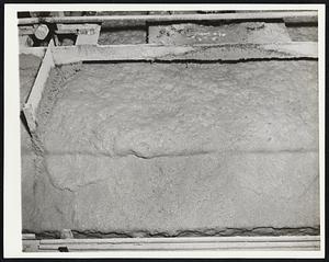 A Vital Wartime Metal - This looks like soap bubbles and that's just what it is. These bubbles raise tons of manganese ore daily by the "flotation" method, one of the steps in preparing the ore for the production of open hearth steel.