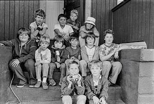 Kids sitting on the stoop