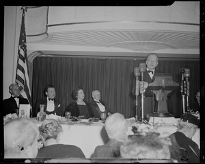 Harold Stassen speaking during the Middlesex Club's Lincoln dinner at the Statler Hotel, as Henry Cabot Lodge, Jr. and others listen