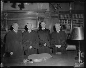 Edmund V. Keville (second right) after induction as Probate Court Judge poses with Judges Wilson, Mahoney and Sullivan after Suffolk Court ceremony