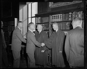 Massachusetts Supreme Judicial Court Justices Raymond S. Wilkins and R. Ammi Cutter in a receiving line to shake hands with other men