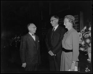 Arthur E. Whittemore, prominent Boston trial lawyer, formally seated as associate justice of the Supreme Judicial Court of Massachusetts yesterday, is shown with his wife being congratulated by Justice Felix Forte, left