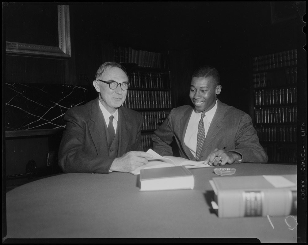 New associate justice of the Supreme Judicial Court of Massachusetts Arthur E. Whittemore looking at documents with law clerk James M. Harkless