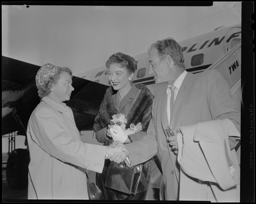 Amanda Blake "Kitty" and Milburn Stone "Doc" are greeted by Miss Elizabeth Storer of Needham, Mass., a member of the 3rd Annual Cerebral Palsy Telethon Committee